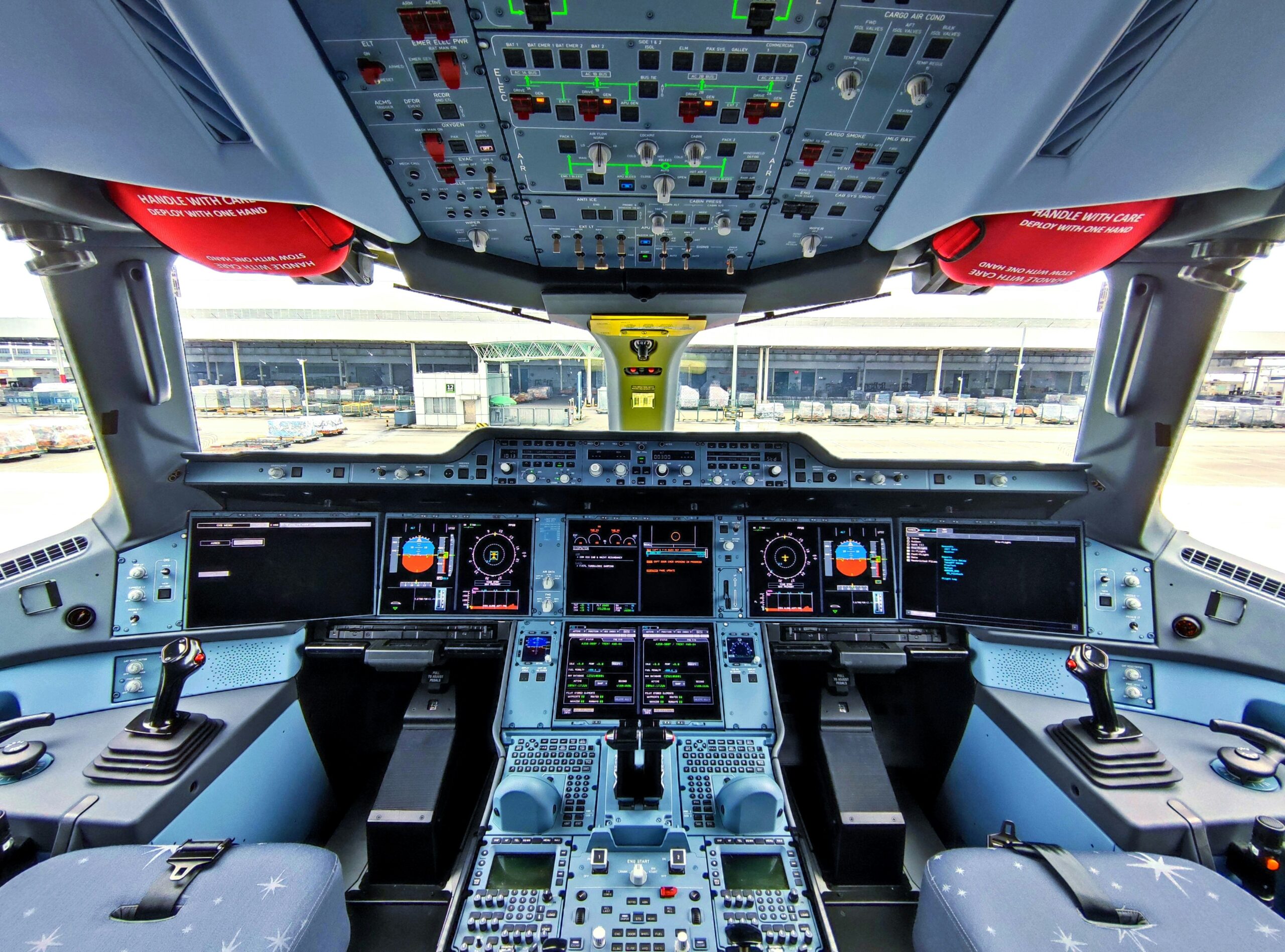airline pilot flying aircraft cockpit